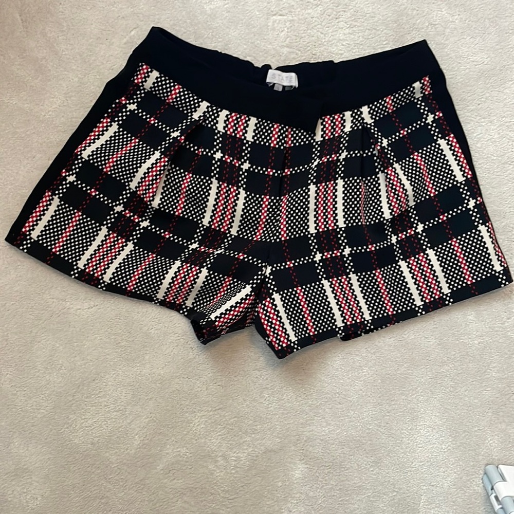 1. State black, red and white plaid shorts! Size Small. Super cute